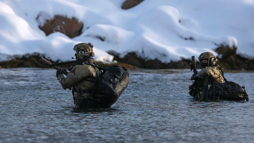 Royal Marines execute extraction under fire in the freezing waters